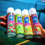 3 red and yellow labeled bottles