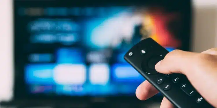 turned-on flat screen television